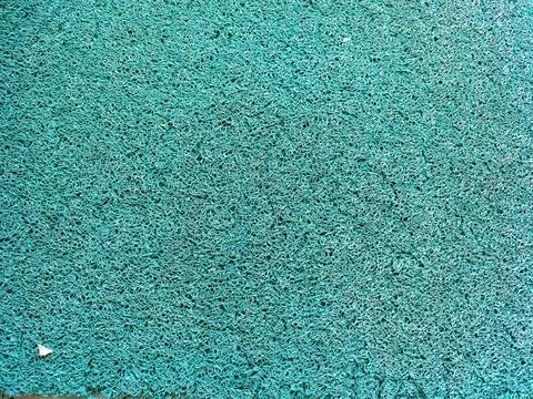 A green plastic mat texture Stock Photos