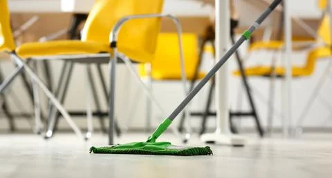 Green plastic mop 스톡 사진