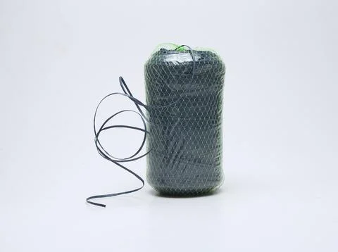 Green plastic rope roll isolated on white background Stock Photos