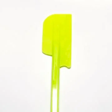 Green plastic spatula Stock Photos