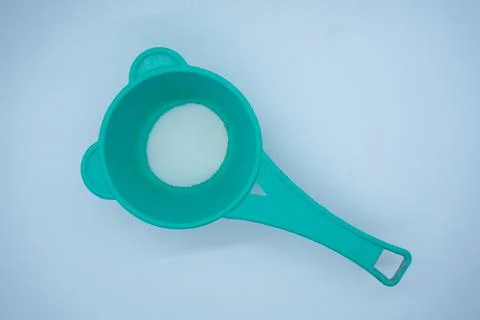 Green plastic strainer Stock Photos