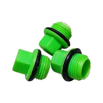 Green Plastic Threaded Plugs with Black Rubber O-Ring Seals Stockfoto's