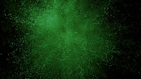 Green powder exploding on black background in super slow motion, shot with Video stock 84299936