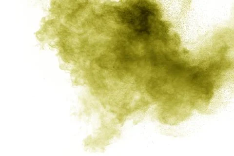 Green powder explosion cloud on white background. Stock Photos