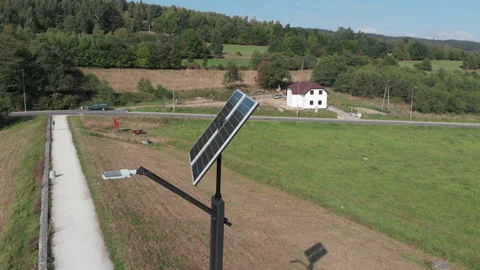 Green power generation by solar panels. Camera slowly rotating around Stock Footage 103659701
