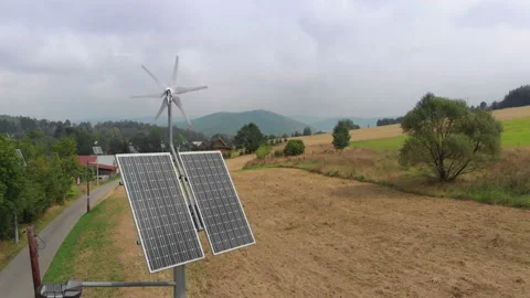 Green power generation by solar panels. Camera slowly rotating around Stock Footage 103698370