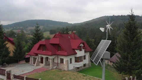 Green power generation by solar panels. Camera slowly rotating around Stock Footage 103797748