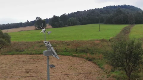 Green power generation by solar panels. Camera slowly rotating around Stock Footage 103800862