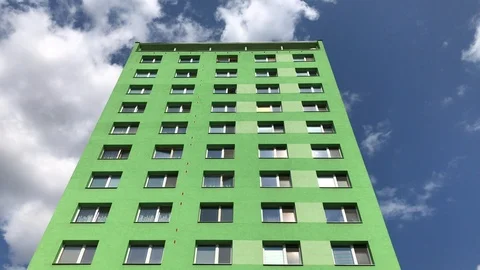 Green prefab flat block under blue sky Stock Footage 94263468