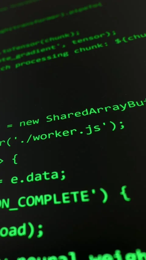 Green Programming Code Scrolling on Dark Computer Monitor Screen 動画素材 334727875