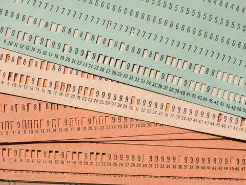 Green punched card for programming 库存照片