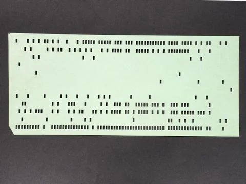Green punched card for programming Stock-Fotos