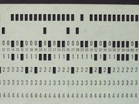 Green punched card for programming 스톡 사진
