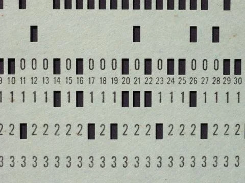 Green punched card for programming 写真素材