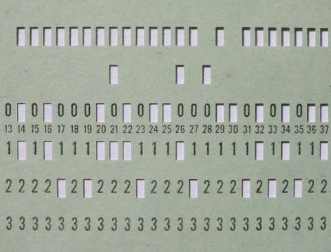 Green punched card for programming 库存照片