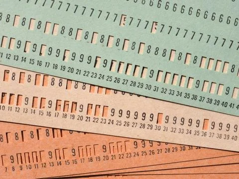 Green punched card for programming 库存照片