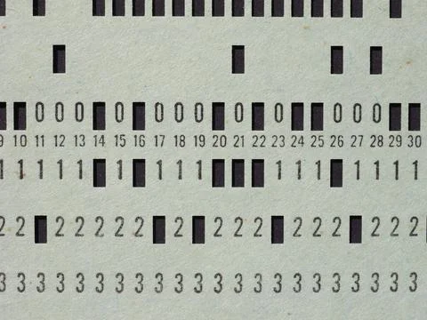 Green punched card for programming Stockfoto's