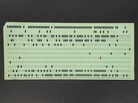 Green punched card for programming Stockfoto's