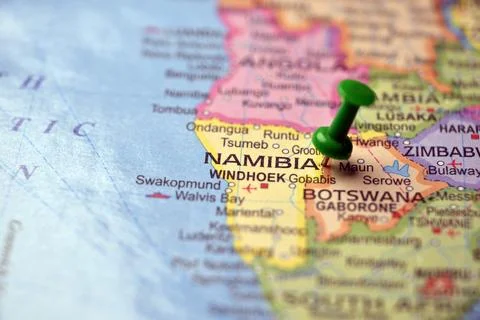 Green Push Pin Highlighting Namibia on Paper World Map Macro Close Up with .. 스톡 사진