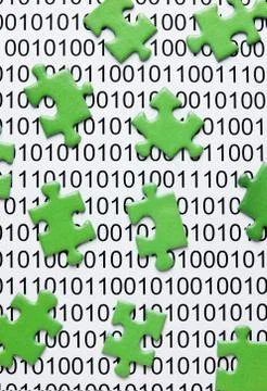 Green puzzles and binary code 写真素材