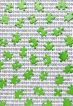 Green puzzles and binary code 库存照片