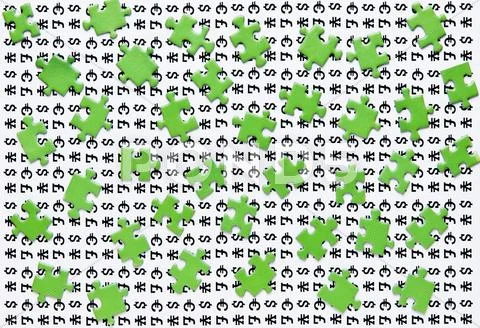 Green puzzles and symbols of money Stock Photos