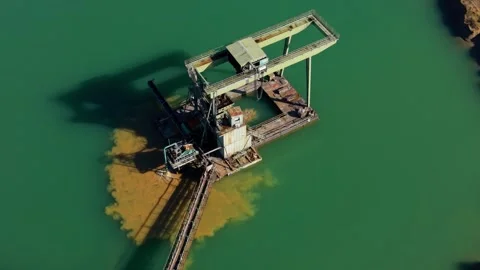 Green Quarry Lake With Floating Dredging Machine From Above Stock Footage 328961502