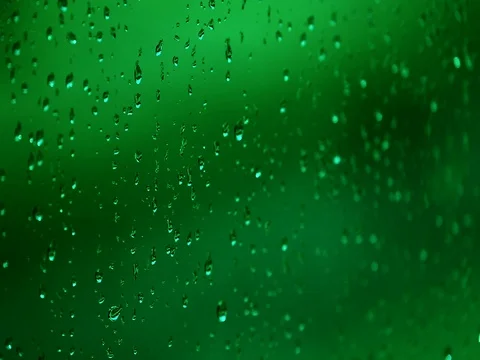 Green rain drops on window Stock Footage 76678227