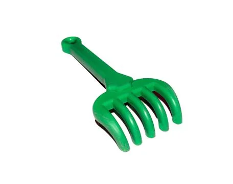 Green rake childrens Stock Photos