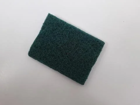 Green rectangle shape Polyester Scrub Pad Utensils for Cleaning isolated on w Stock Photos