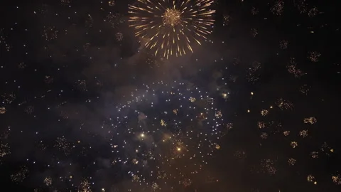 Green to red fireworks at night sky in slow motion, handheld shot. Stock Footage 253399208