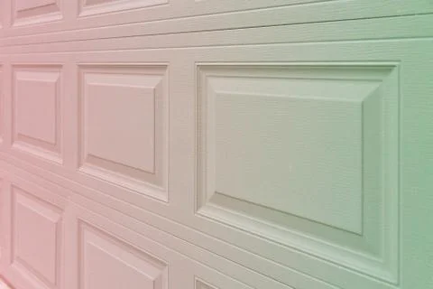 Green to reddish gradient garage door paneling. Stock Photos