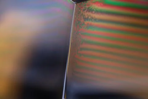Green reflections, bright warm light, fluid abstraction Foto stock