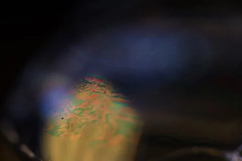 Green reflections, bright warm light, fluid abstraction Stock Photos