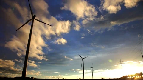 Green renewable energy concept - wind generator turbines in sky Stock Footage 48918980