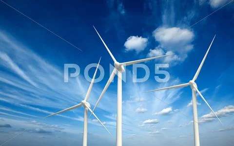 Green renewable energy concept - wind generator turbines in sky Stock Photos