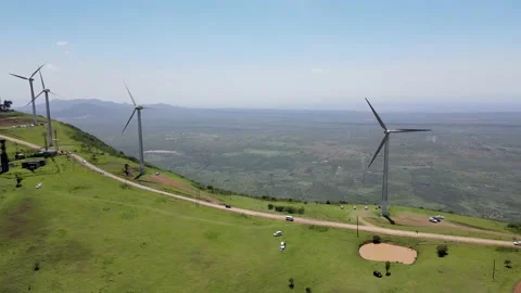 Green renewable wind energy fighting deforestation on planet earth against Stock Footage 149485283