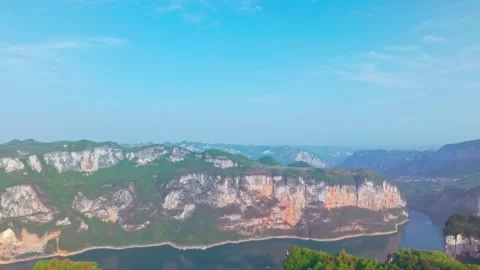 Green river between two vertical canyons Stock Footage 311537740