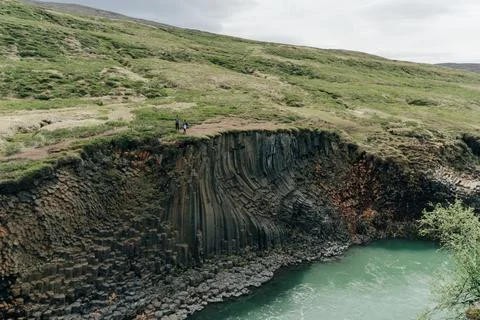 The Green River Through Studlagil basalt canyon, Iceland Stock Photos