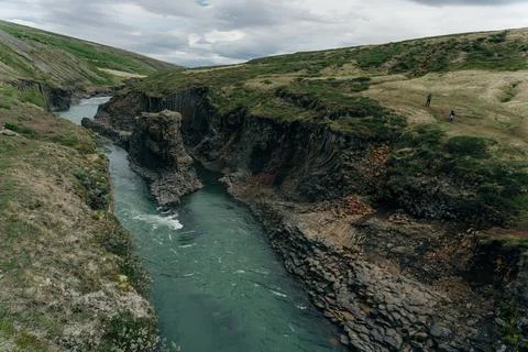 The Green River Through Studlagil basalt canyon, Iceland Stock Photos