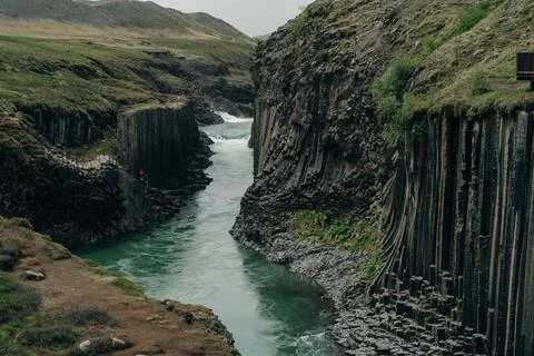 The Green River Through Studlagil basalt canyon, Iceland Stock Photos