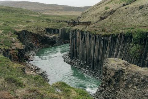 The Green River Through Studlagil basalt canyon, Iceland Stock Photos