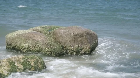 Green rocks in the sea Stock Footage 112890056