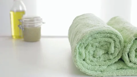 Green rolled towels Vídeos de archivo 69242691