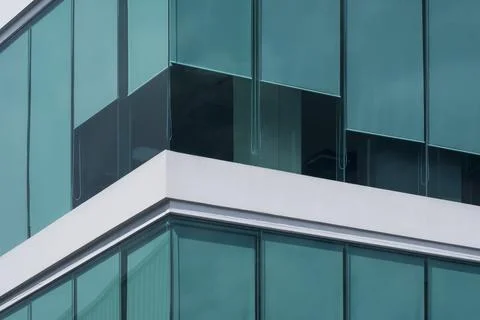 Green roller blinds inside of modern glass office building Fotos de archivo
