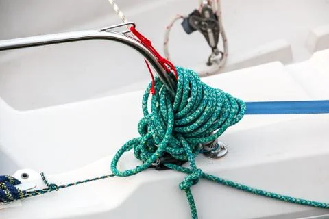 Green rope of a ship in the harbor Stock Photos