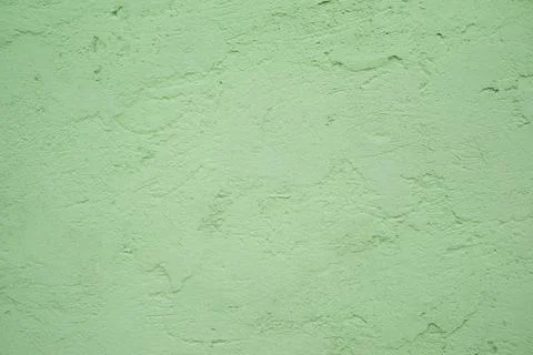 Green rough plastered texture wall, background. Stock Photos