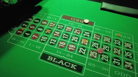 Green Roulette Table Green Lighting Angled View With Bets Stock Footage 252289803