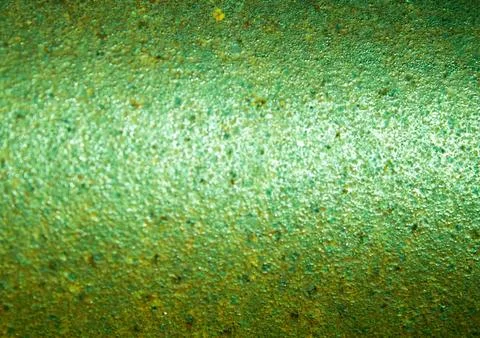 Green rust showing through on corroded metal surface background Stock Photos