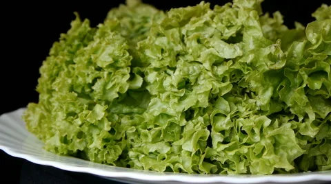 Green Salad On The Black Background Video stock 65774281